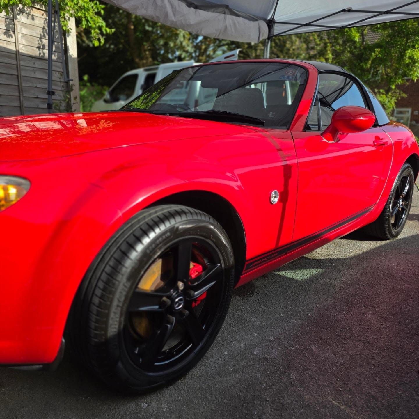Red Mazda MX-5 after exterior valet