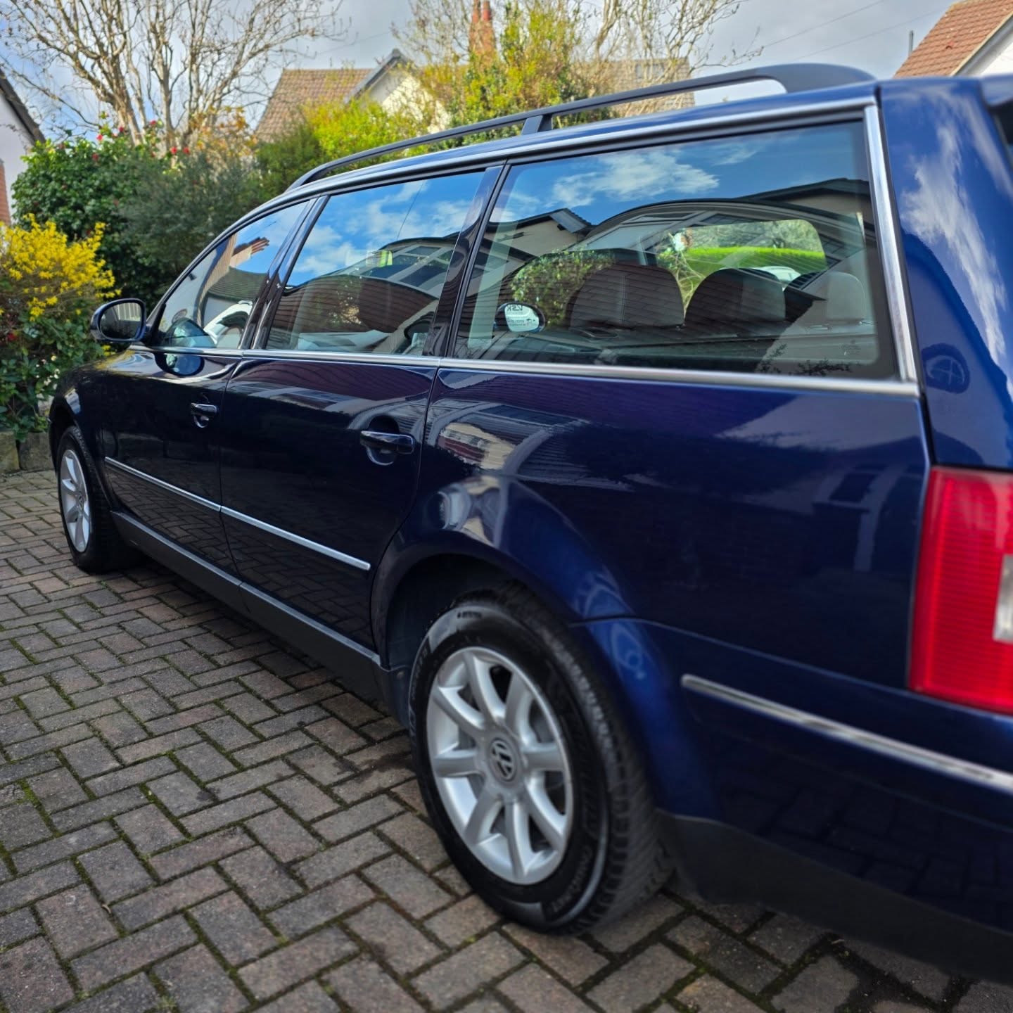 Blue VW Passat estate after a full valet